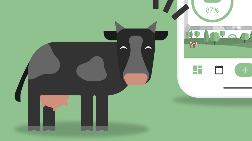 Illustration einer Kuh vor einem Smartphone auf Webseite der App "meatless"